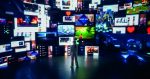 Back View Of Caucasian Woman Looking at 3D Cyberspace With Animated Social Media Interfaces, Online Video Games, Videos, Internet Content. Visualization Of Female Enthusiast Surfing Computer Network.